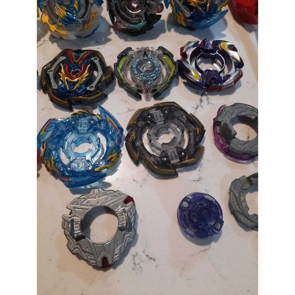 Lot Of 8 Beyblade And Different Parts